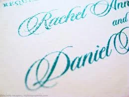 This is an example of Thermography. Note how "shiny" and "bubbly" the ink looks up close. 