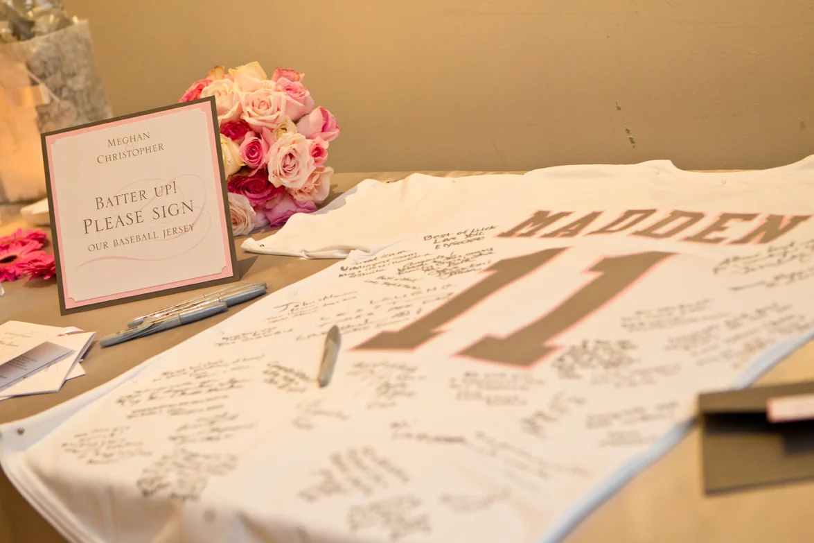 Instead of a traditional guest book, guests signed a baseball jersey. 