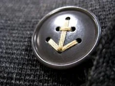 We think this anchor detail sewn through the button would be a fabulous detail on a bouquet!