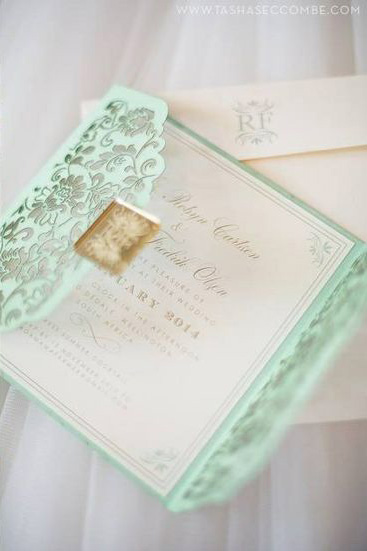 This breathtaking laser cut Mint Green Wedding Invitation takes our breath away!