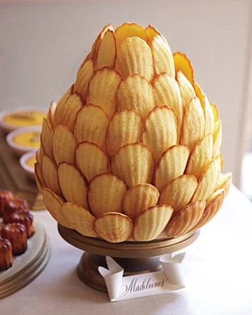 Madeleine Cookie Tree - Madeleines are delicious cookies and great for a party. We love this cookie tree because it looks like a pine cone! You could make chocolate madeleines and make it look even more like a pine cone! YUM!