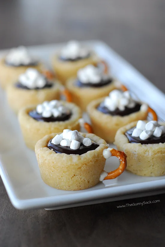 Hot Chocolate Cookie Cups - When I first saw these cookies I said, OMG - these are adorable!!! You could change out the cookie dough and even the ganache to make different flavors of this cute cup. Dark Chocolate Cup with Salted Butterscotch ganache? Yum.....!
