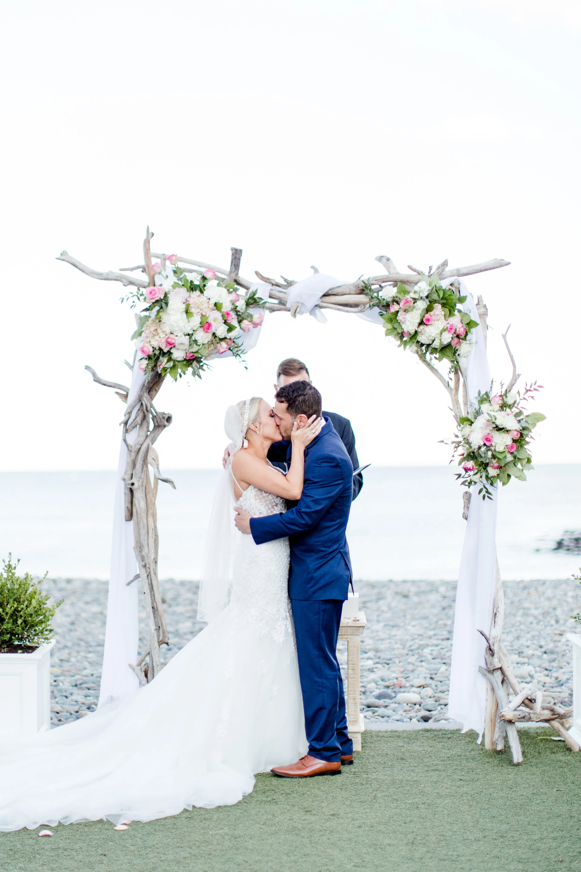 Stephanie + Brian moments after saying “I do” at their Oceanview of Nahant wedding (Nahant, MA)