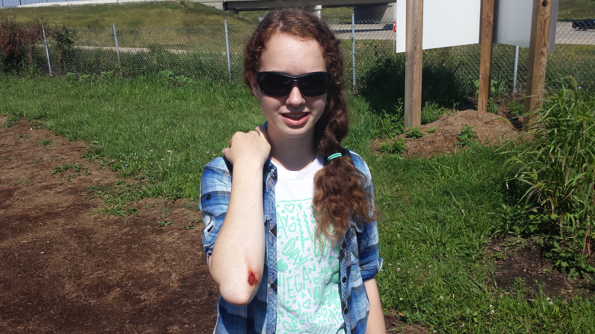 During Climate Camp's bicycle tour of Indianapolis, Iris had a mishap on her bike. Like a warrior, she got right up and kept on biking.