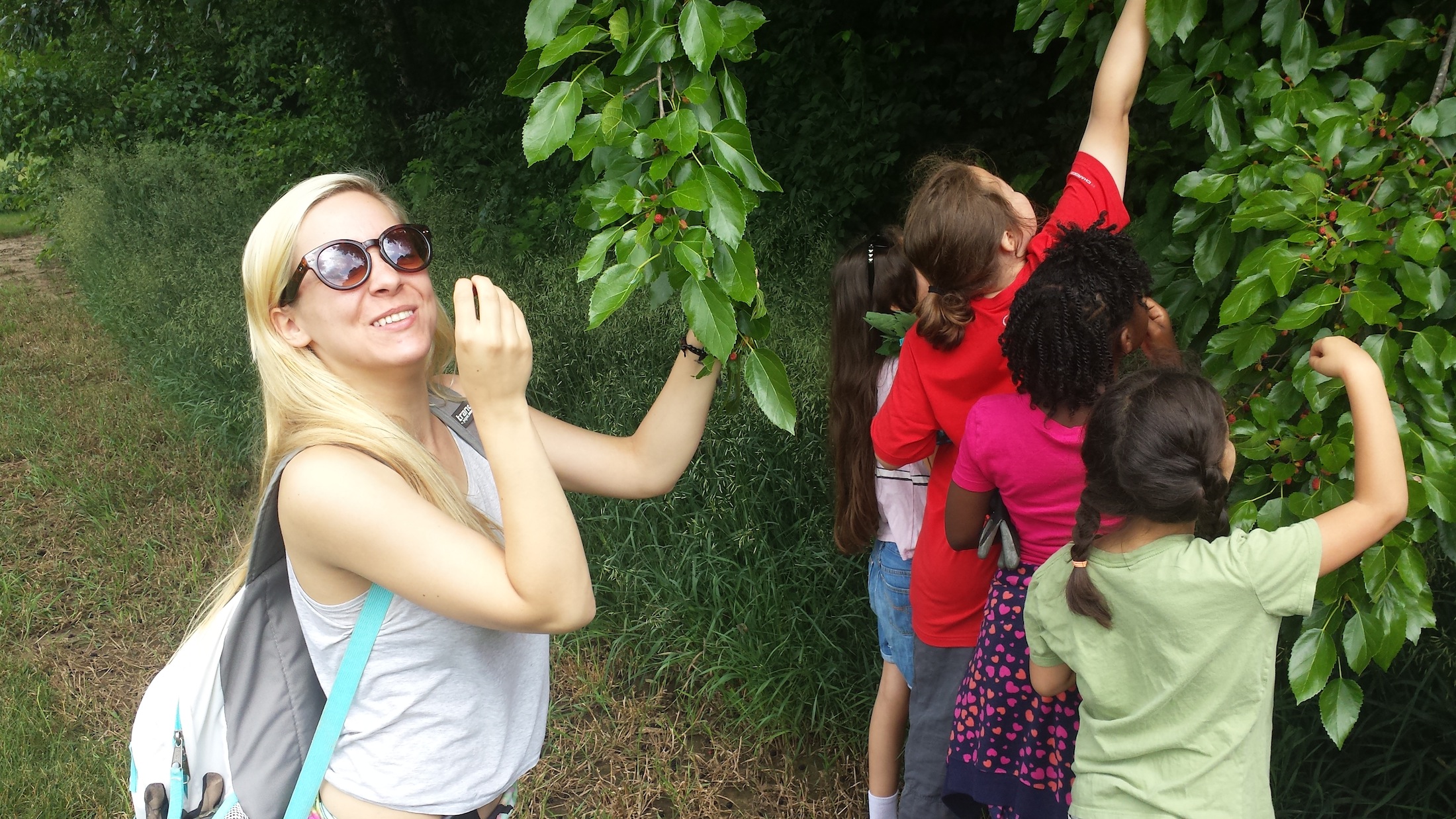 Author of this blog, Alexis, enjoys the feast of nature at our June daycamp at White Pine Wilderness Academy.