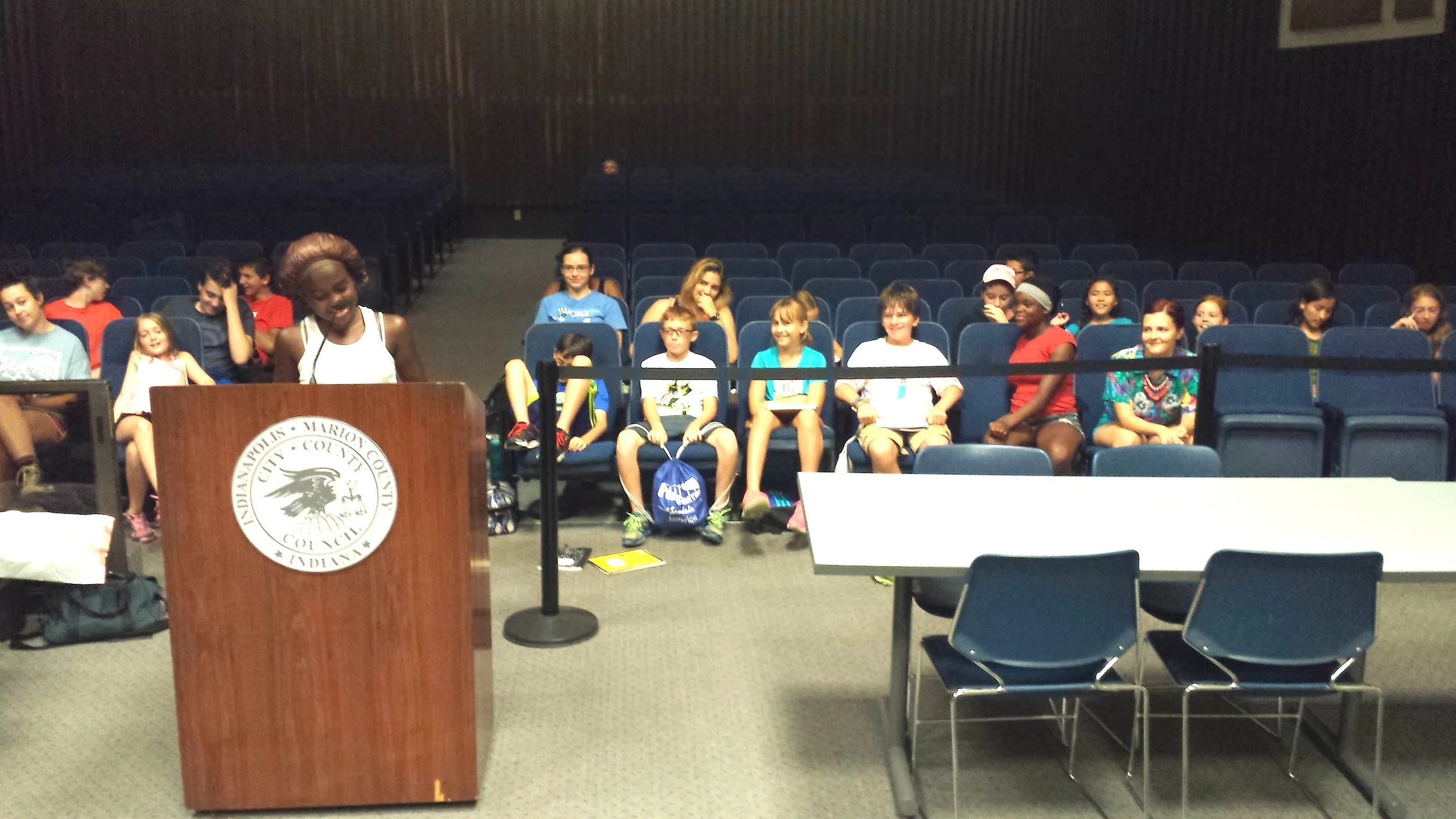 Ocean, 11, a student at St. Thomas Aquinas, focuses on the science of climate change in her testimony.