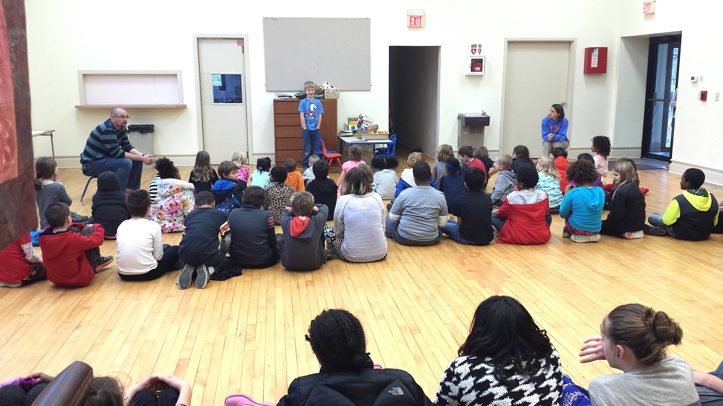 Here, Carter Brooks speaks to his entire school, School for Community Learning, about the importance of signing the Petition to support Climate Recovery in Indianapolis.