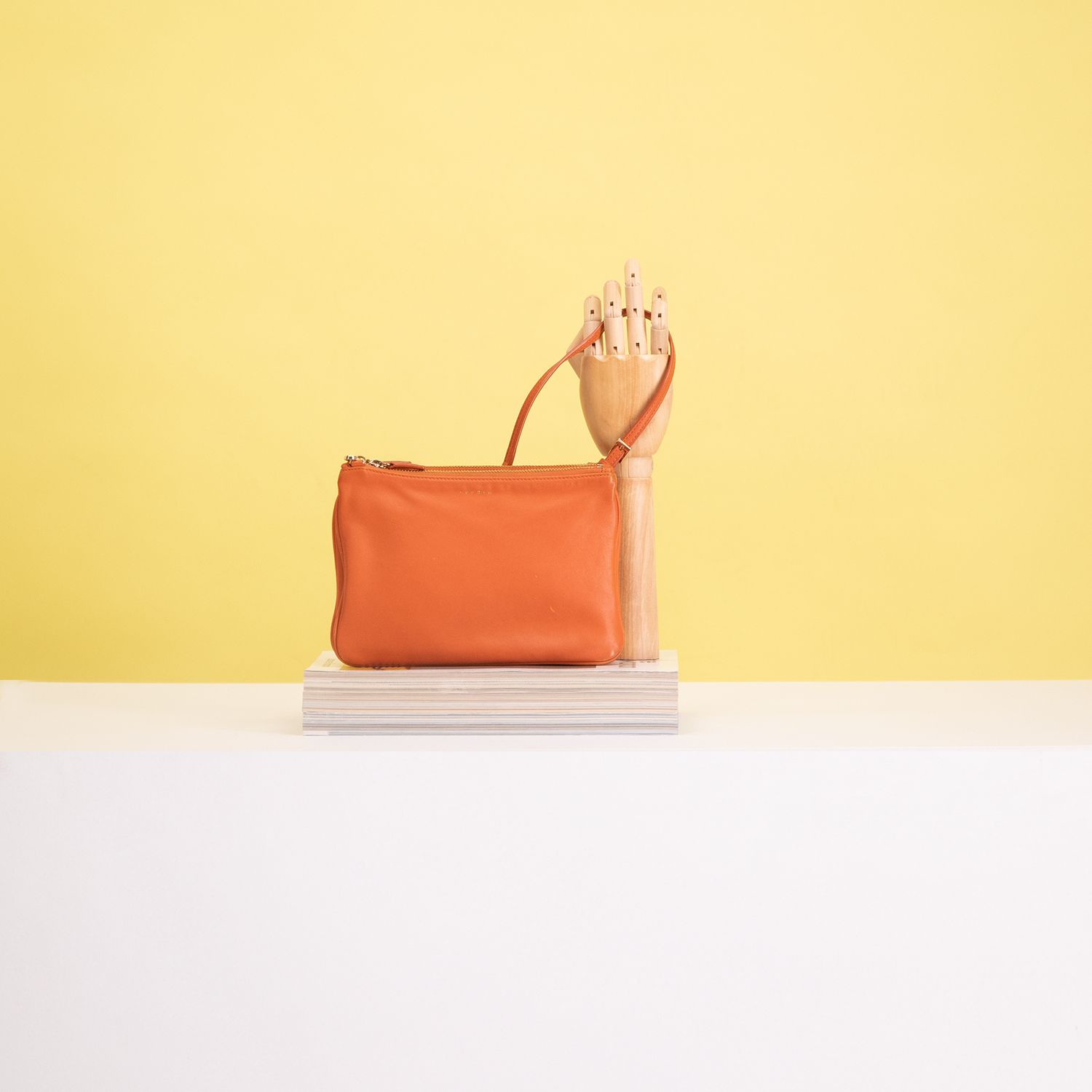 crea bag hand geel oranje.png