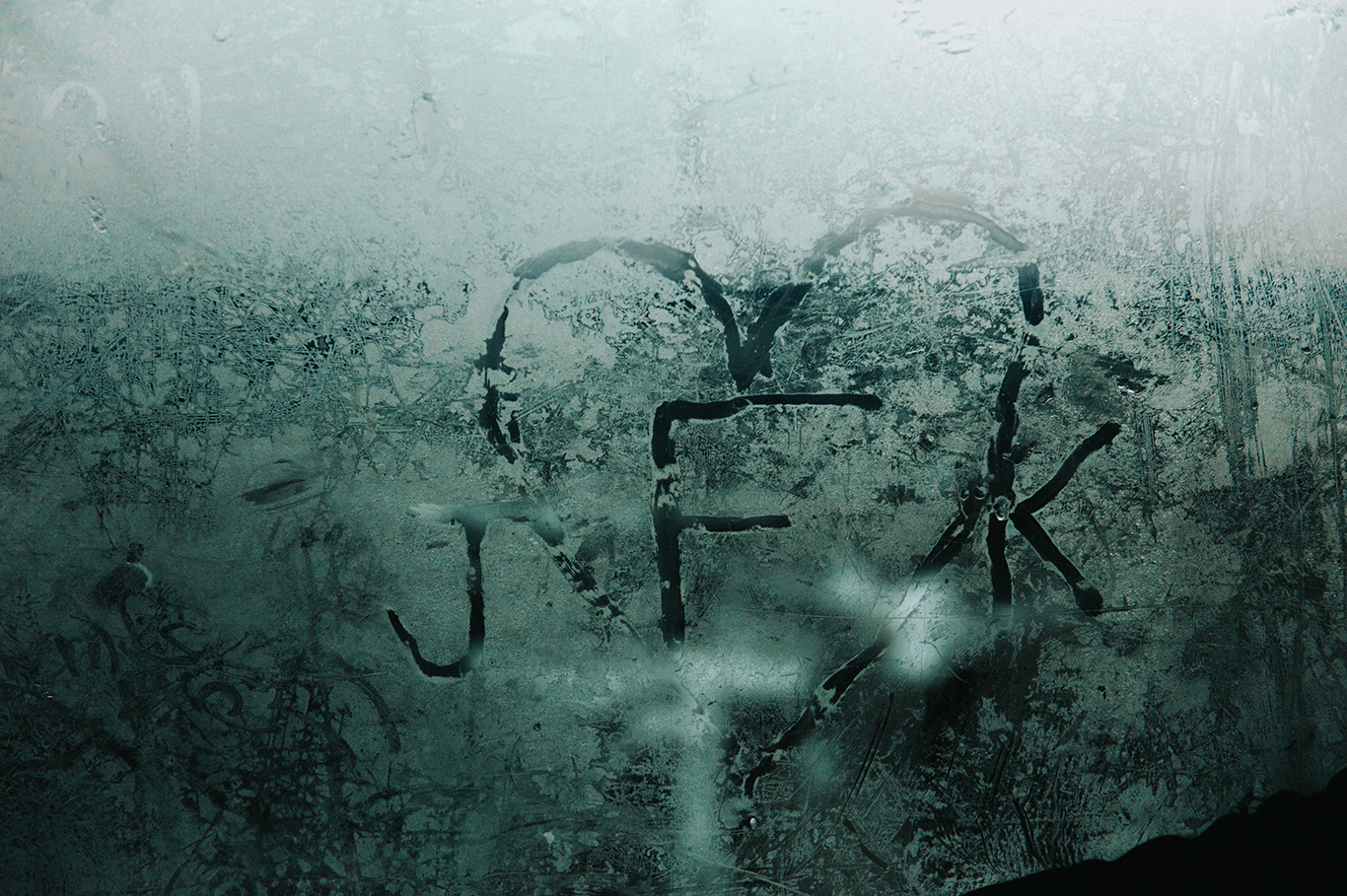 JFK-initials-on-frosted-window.jpg