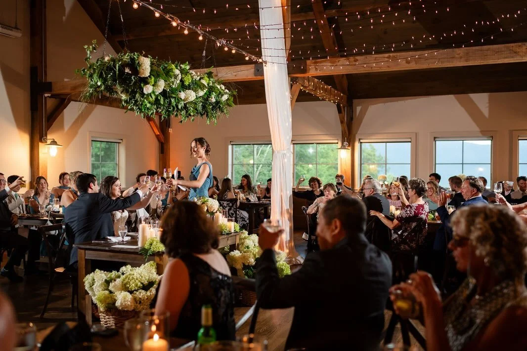 The part of a wedding day that not a lot of photographers show is actually the longest part of the day and one of the hardest parts to photograph well: the reception.

Portraits are easy in the sense that I can choose the light, the location, the ang