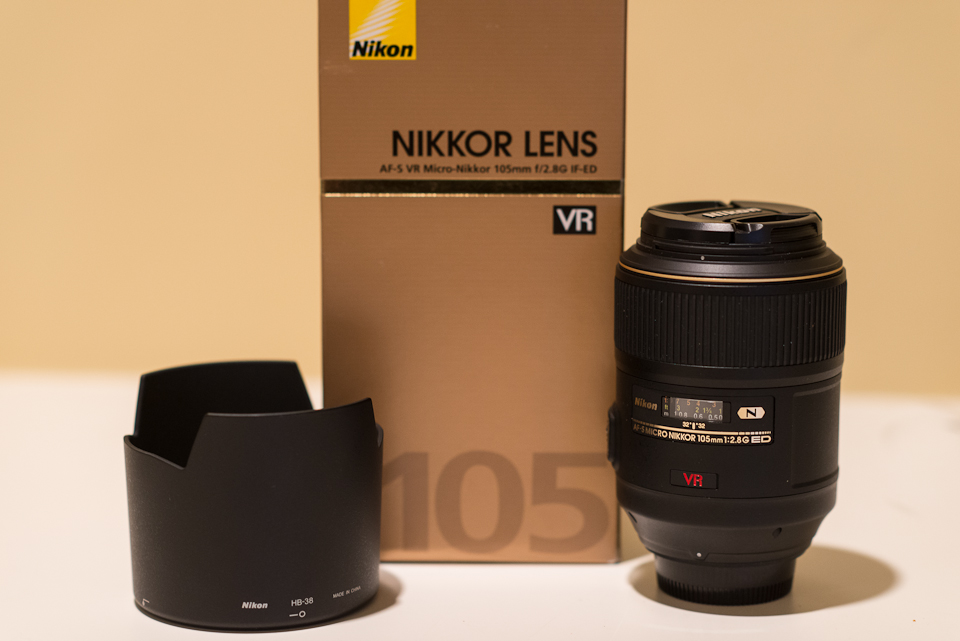 Like New -Comes with original caps, box and lens hood.