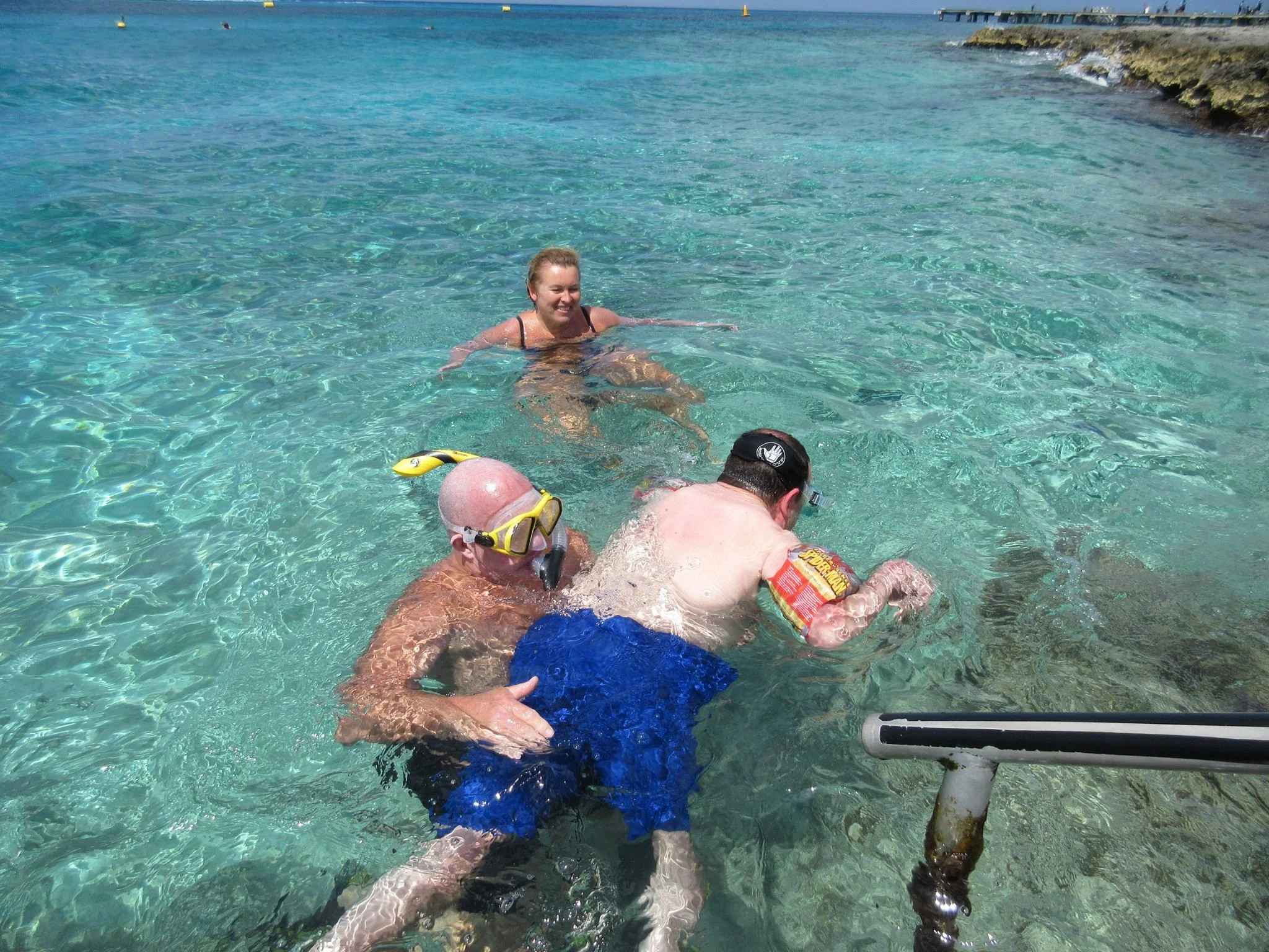 Diving down to heaven. Yes, those are SpiderMan water wings...don't judge....
