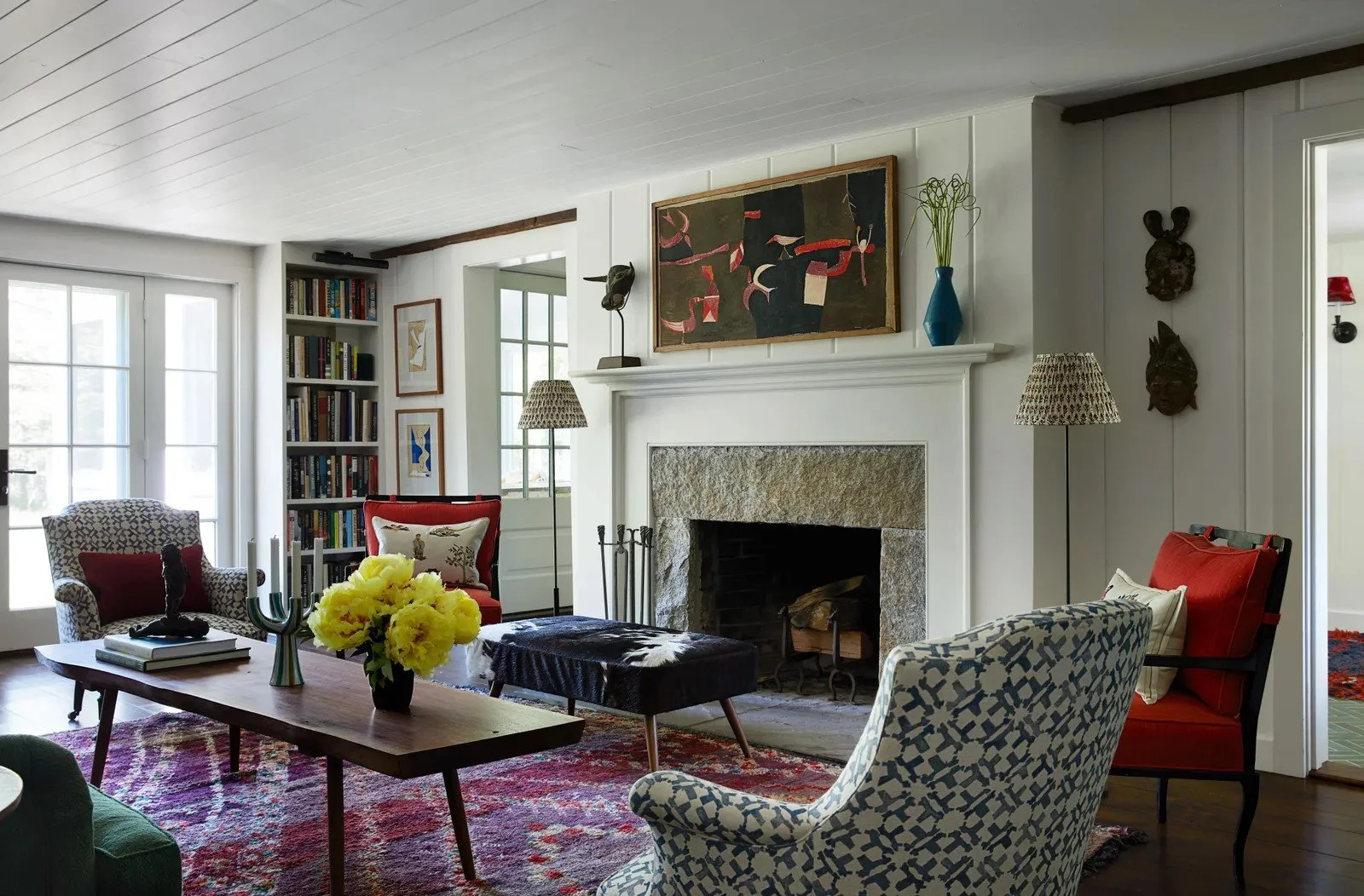  The living room of the Berkshires home of Victoria and Jed Cairo, designed by Sachs Lindores Architecture, Interiors. Stephen Kent Johnson, © 2021 Mogens Andersen / Artists Rights Society (ARS), New York.  And the Berkshires farmhouse they designed 