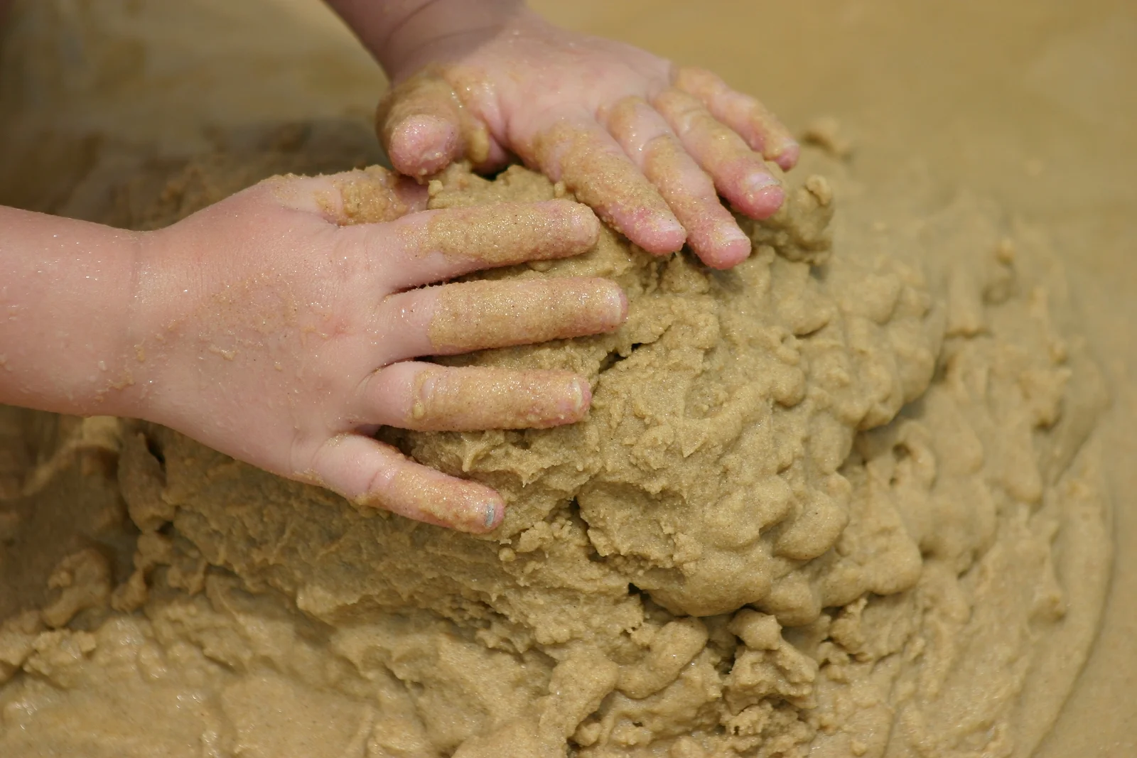 We traditionally think of sandplay therapy as appropriate for children. And it is true that children seem to know immediately what to do in the sand, and in a state of playful, industrious absorption, play through their traumas and seem to magically heal their inner wounds. Yet sandplay is also deeply healing for adults, and can be a valuable adjunct to any kind of therapy, even analytic therapies. It's as if a new "royal road" to the unconscious has opened up, a royal road that leads us to symbols and feelings, reflecting back deeply buried, implicit images of the Self.