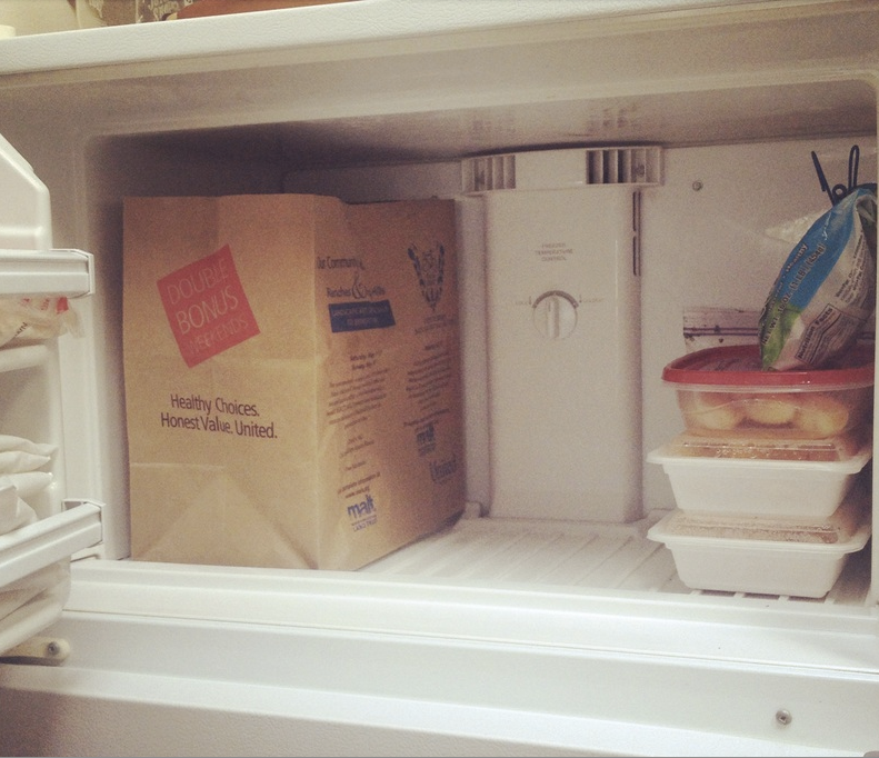 A-ha! Paper bag in the freezer makes for the perfect compost bin.