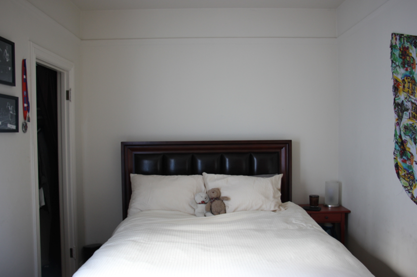 After: With the closet door removed, the bed can now be centered on the wall, creating a comfortable sleeping experience for C and his girlfriend.