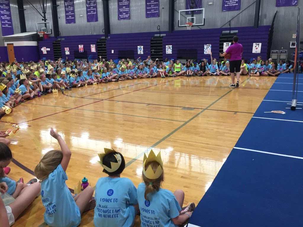 Author Shelly Boyum-Breen speaking to campers at Camp WIN in KC! Look at all those crowns!
