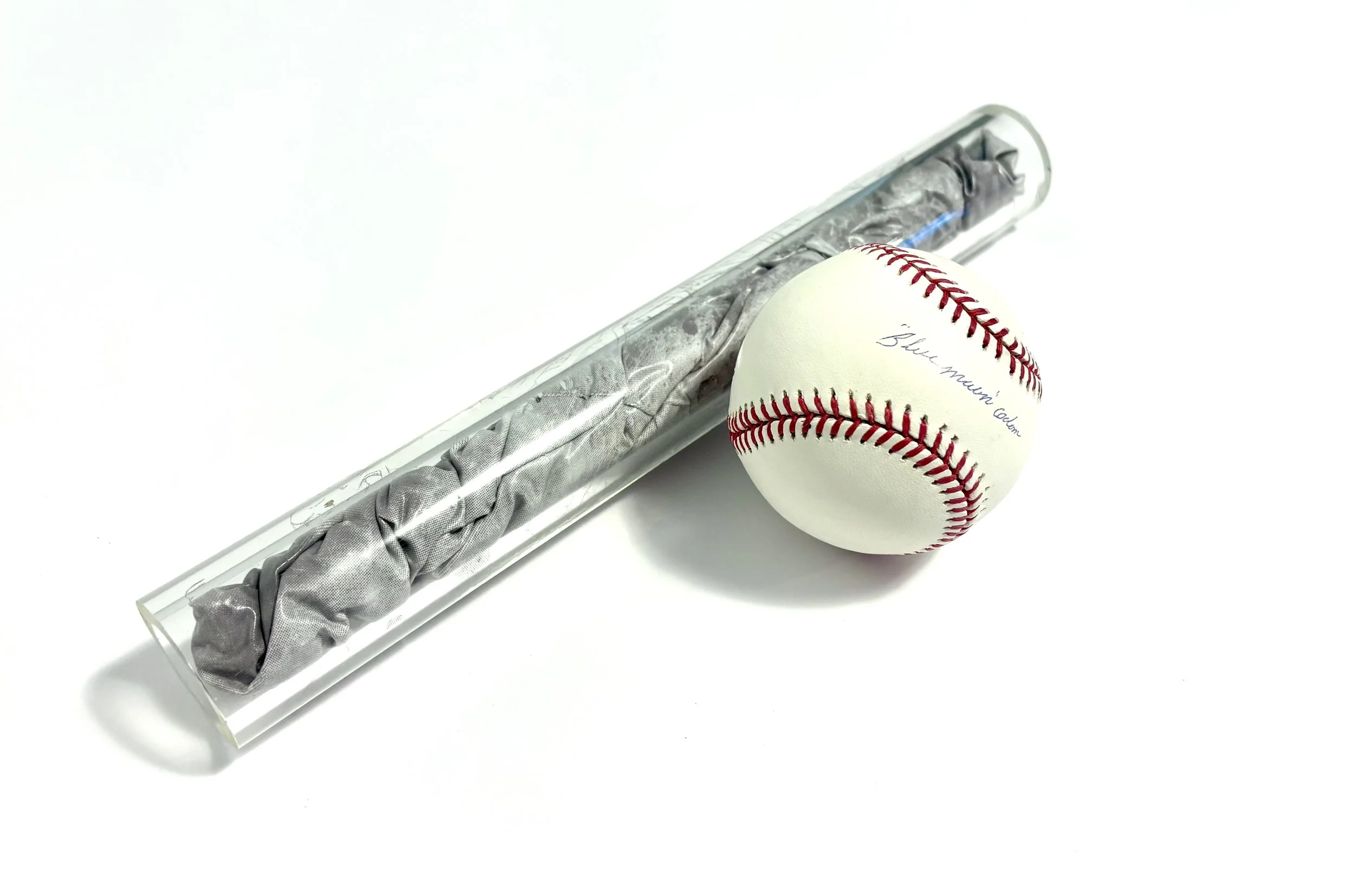 softer omens (two moons) - johnny lee “blue moon” odom’s signature on a rawlings mlb baseball with an inflatable moon globe inside a borosilicate tube