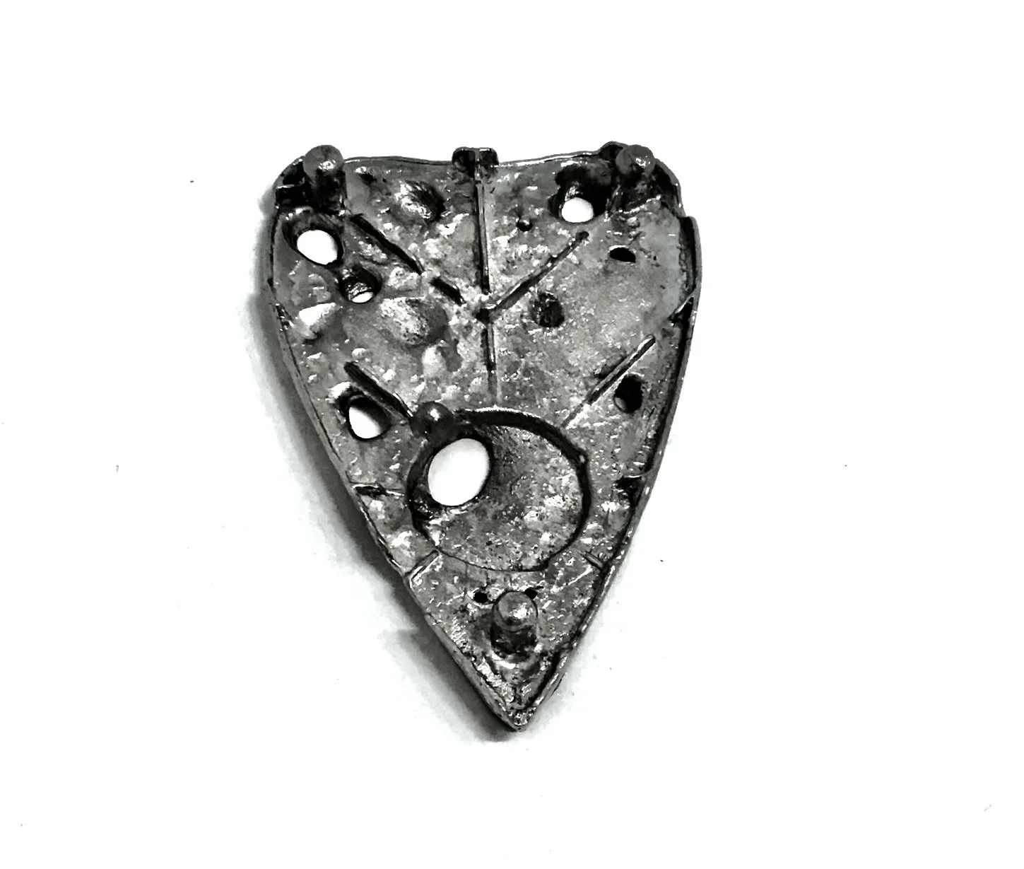 untitled -  pewter cast underside of a vintage william fuld ouija board planchette 