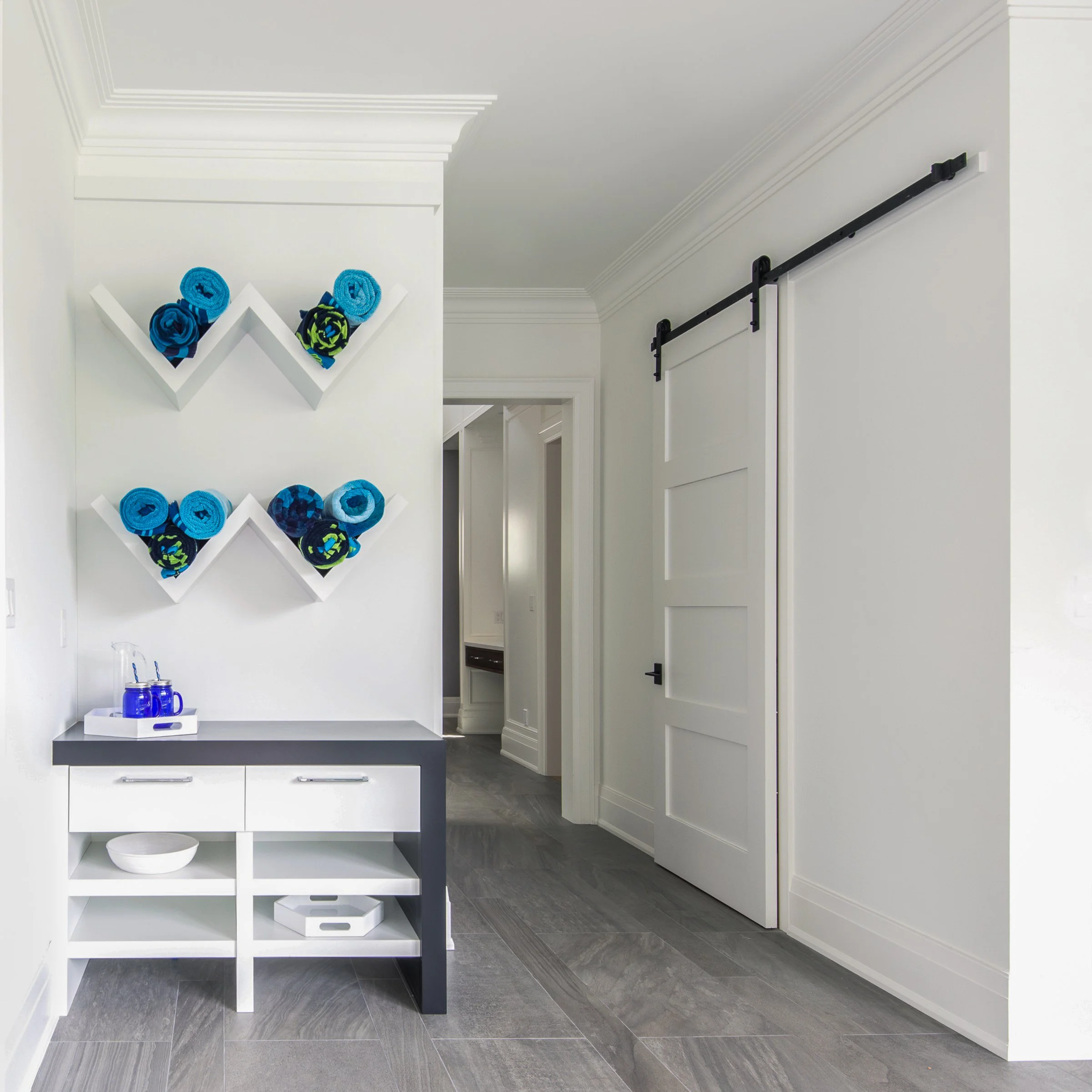 By the exit to the pool.