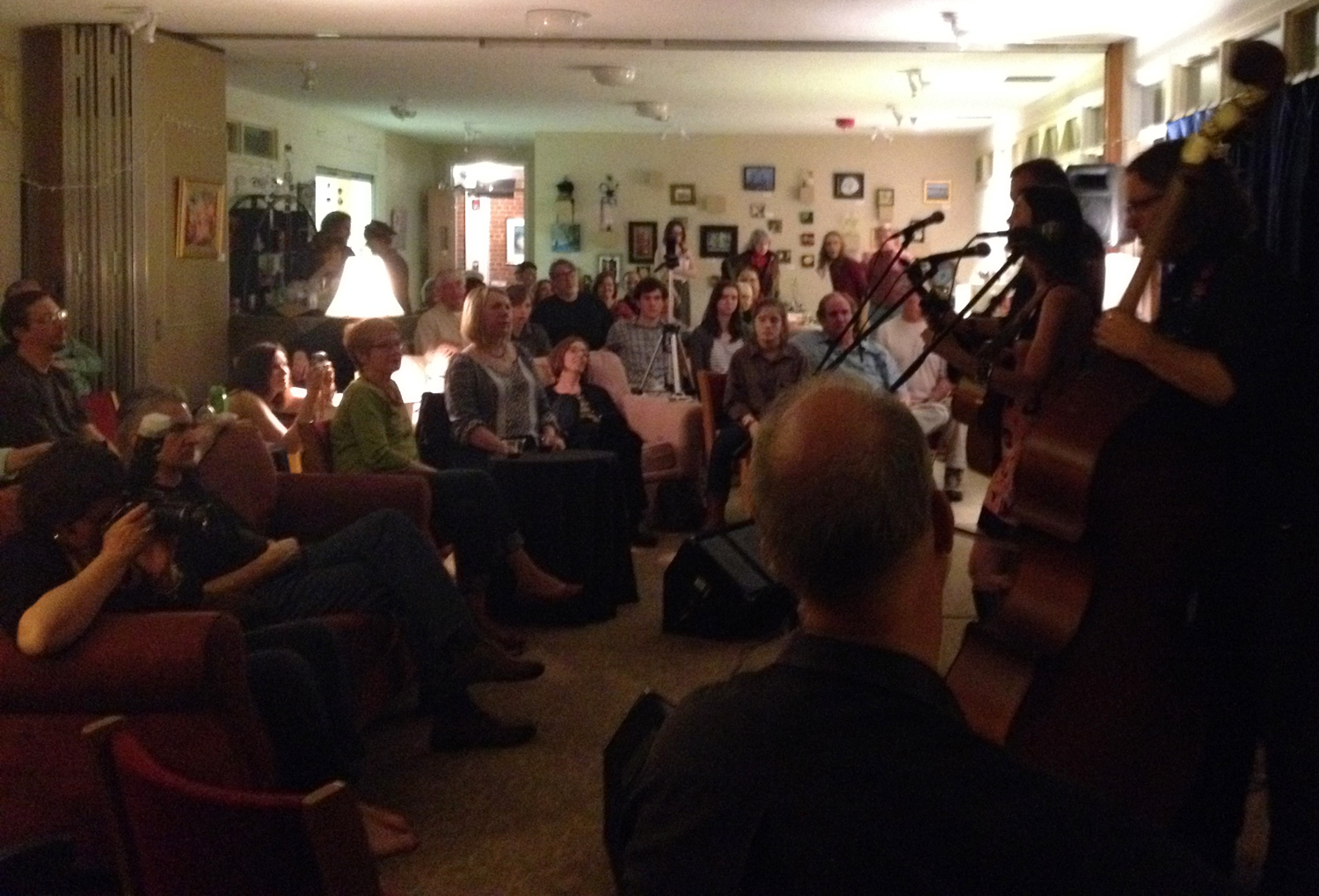 A full house enjoys the sounds of Martha Bassett, Sam Frazier & Pat Lawrence on March 29 at The Creative Center