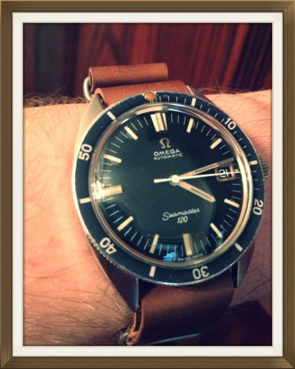 Omega SM120 on MIL strap in Whiskey shell.