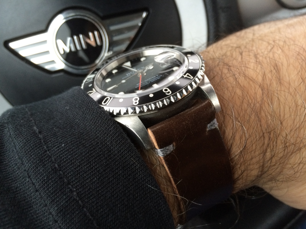 GMT II on a two-piece Cognac strap with gray stitching.
