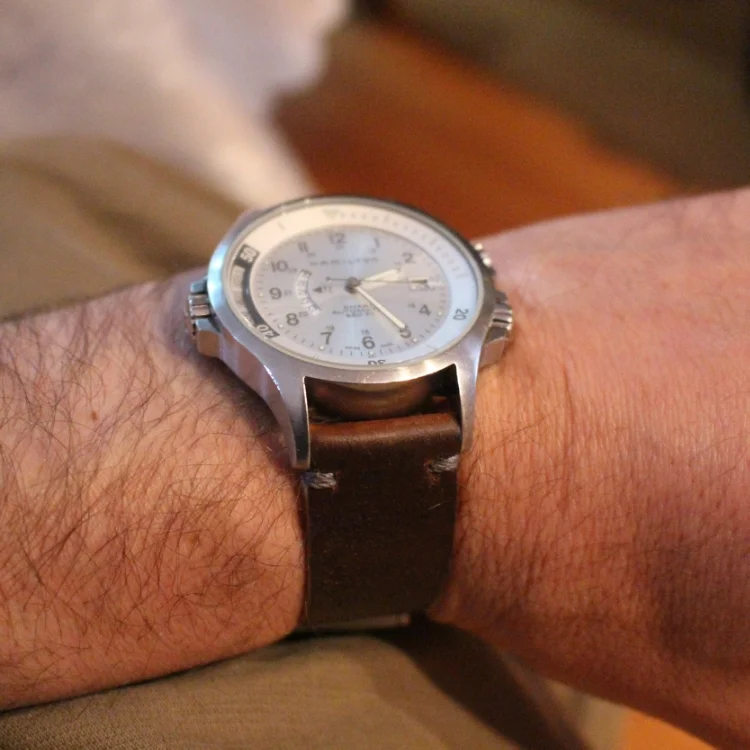 A lovely Hamilton GMT on a two-piece T-stitched Cognac strap. Perfect combo!