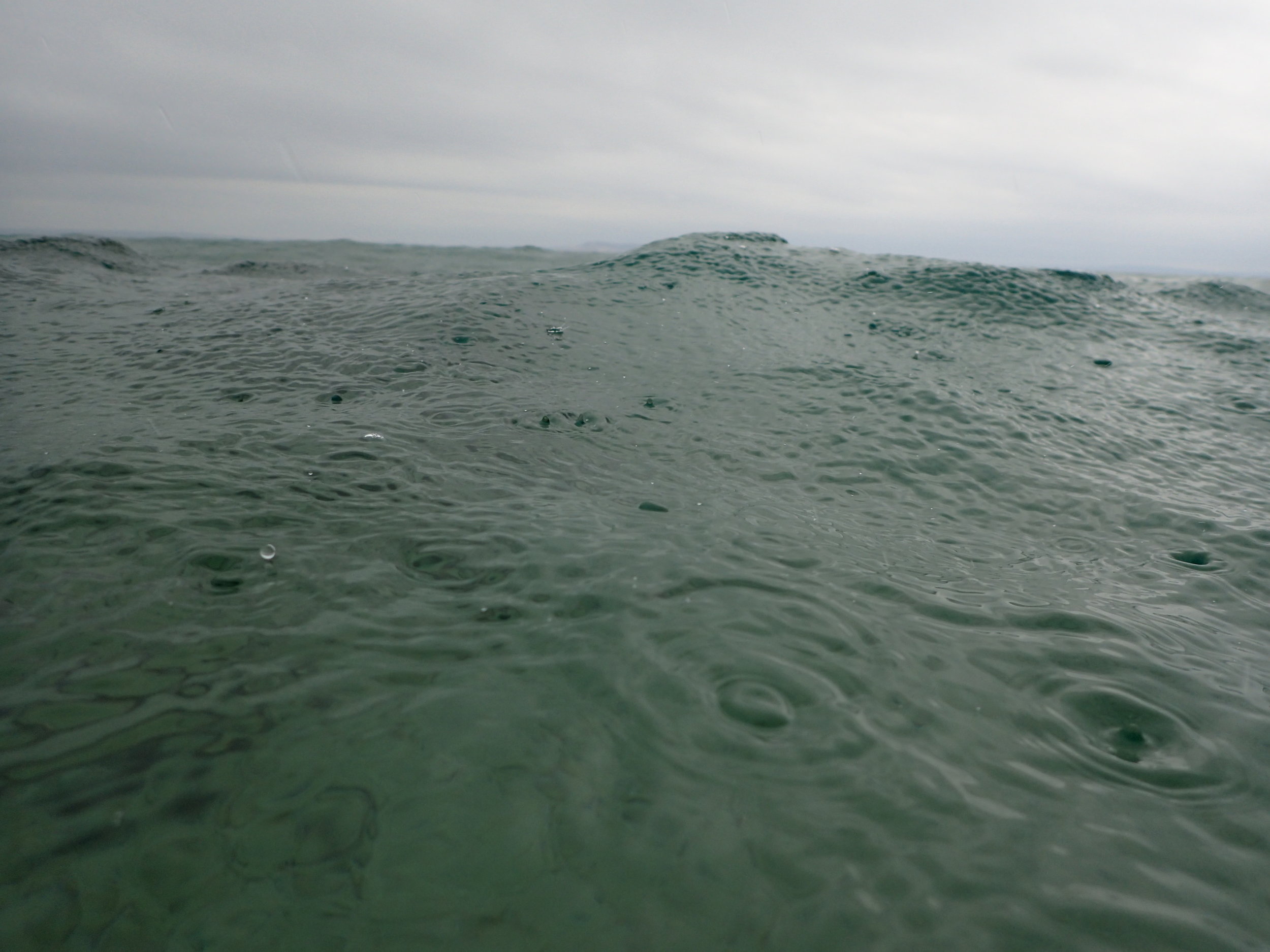 Popping up from the lake bottom to see that the rain had returned. 