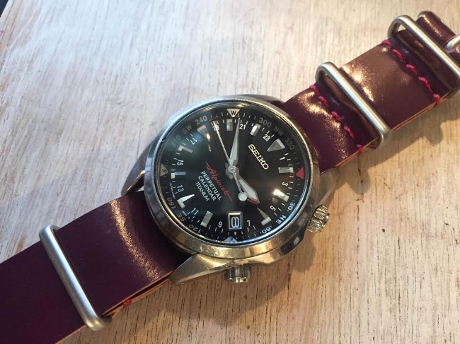 Seiko Alpinist Ti on a Cherry MIL strap with cranberry stitching. Super fetching combo.