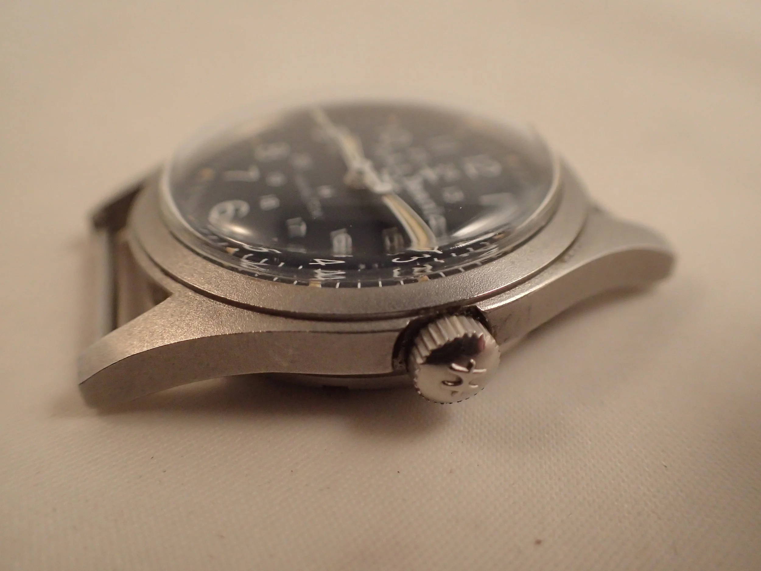 The Hamilton 9219 LL Bean blue anchor-dialed watch. Note the captive strap bars and signed crown.