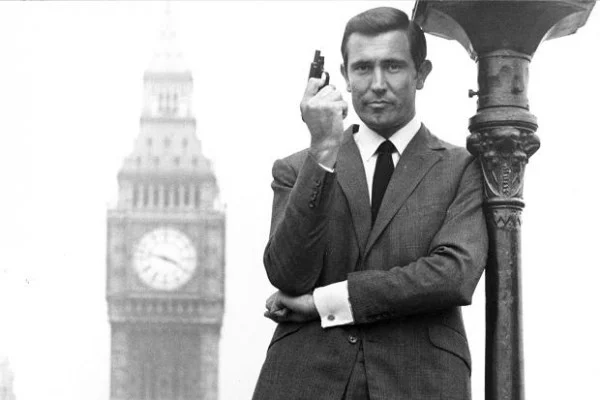 George Lazenby as James Bond.