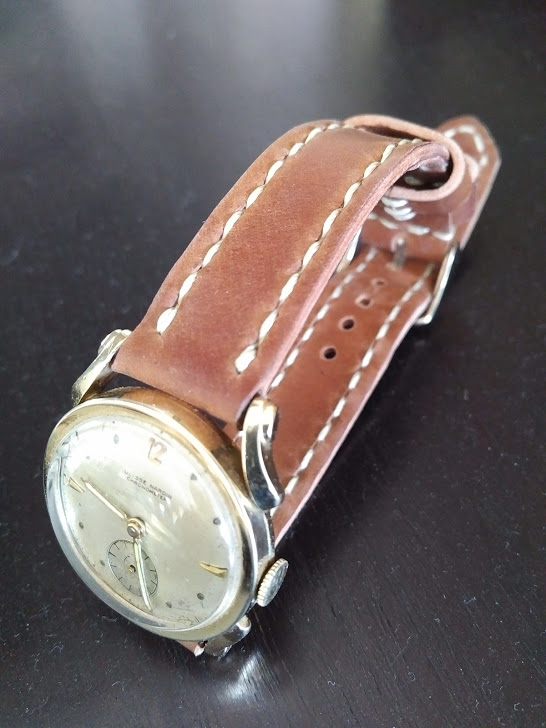 A vintage Ulysse Nardin on Natural Arts & Crafts strap. Look at those beautiful lugs!