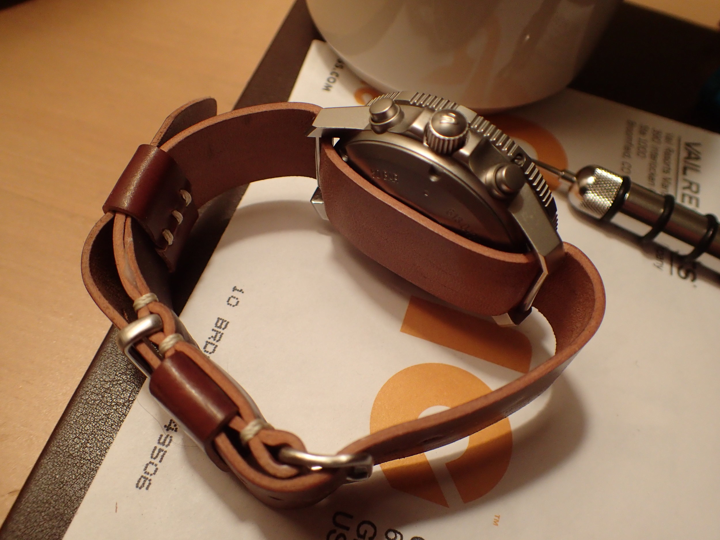 When worn on the wrist, the extra-long tail is kept with a floating keeper. 
