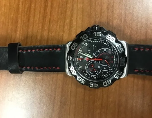 TAG Heuer with hooded lugs on a Black Arts & Crafts with red stitching. Cool combo!