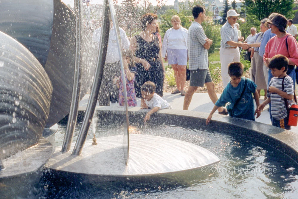 Children play in fountain