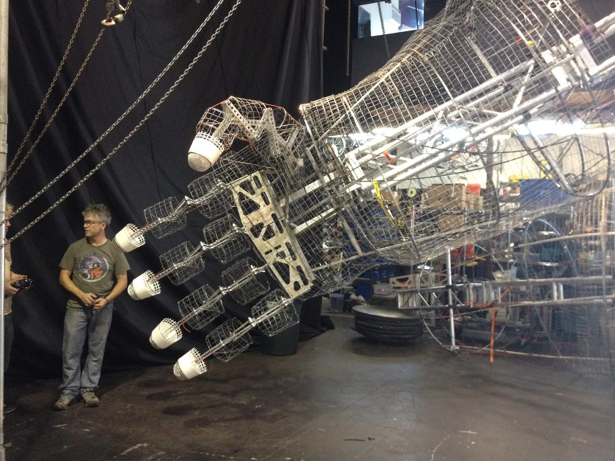 At the Poetic Kinetics workshop, final adjustments were made to dial in the responsiveness of the forearm and fingers. Aluminum scaffolding was used to keep the sculpture appendages lightweight.