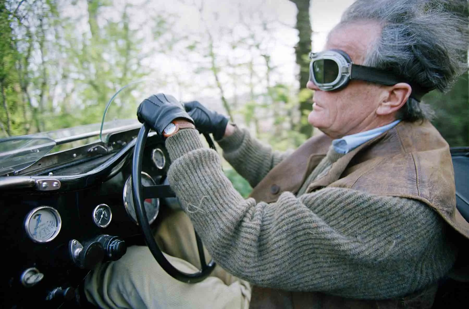 1994 Alan Clark drives his Jaguar SS100. Saltwood, England.