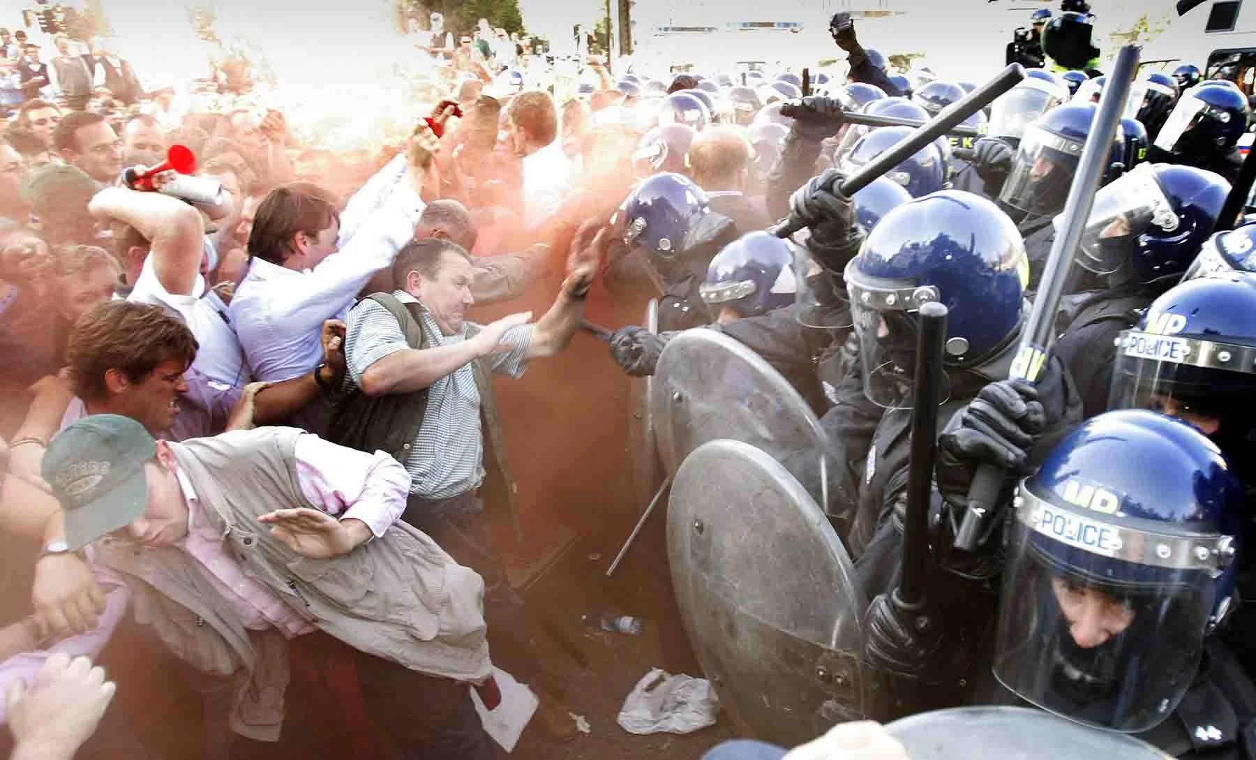 2004 Pro fox hunting demonstrators clash with police outside Parliament. London, England.
