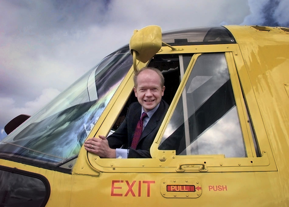 Conservative Party Leader William Hague sits in the cockpit of a helicopter at the Farnborough Air Show. Hampshire, England. September 1998.