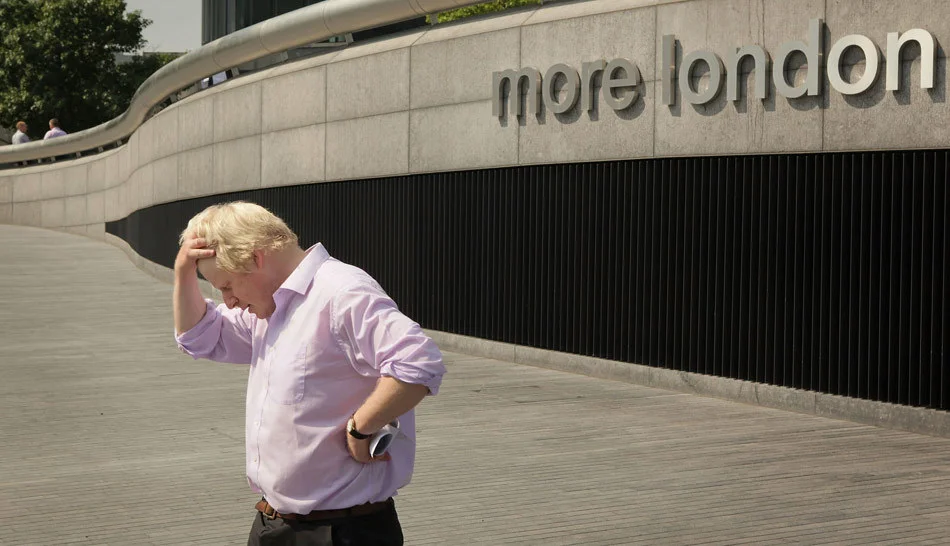 London Mayor Boris Johnson stands near City Hall. London, England. July 2009.
