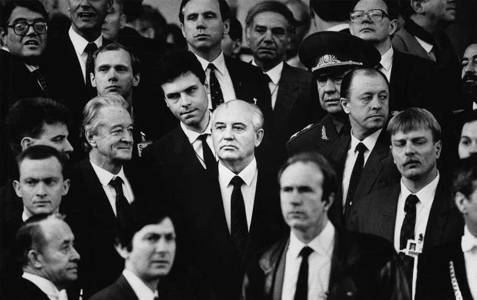 Soviet President Mikhail Gorbachev (centre) stands with other dignataries after attending the Conference on Security and Co-operation in Europe Summit. Paris, France. November 1990.