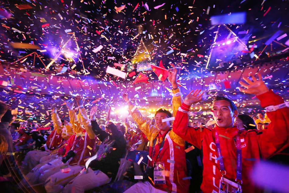 Paralympians enjoy the atmosphere during the closing ceremony of the London 2012 Paralympic Games. London, England. September 2012.