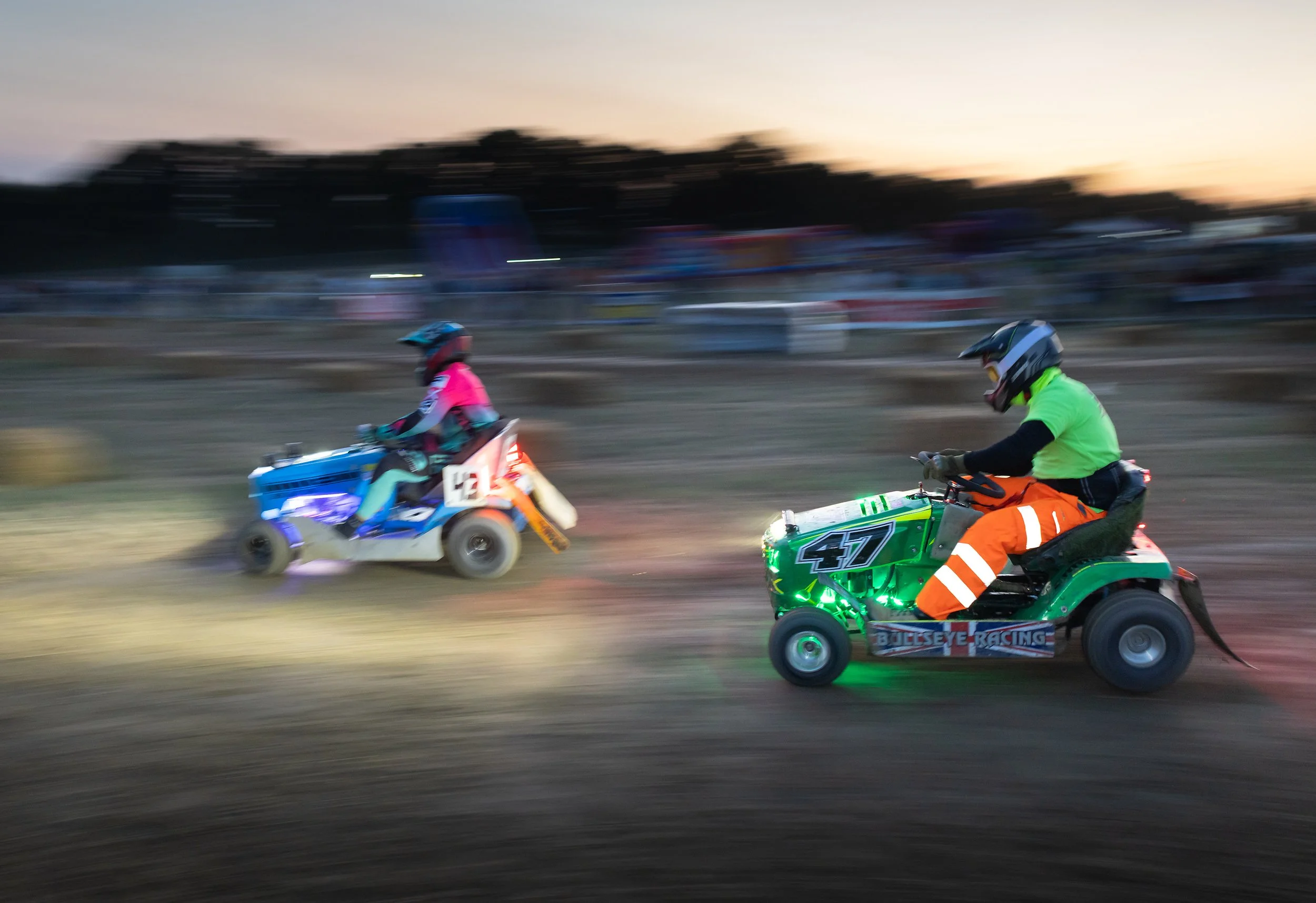 Teams race their grass cutting machines during a 12 hour Lawn Mower Endurance Race in West Sussex on August 16, 2025.
