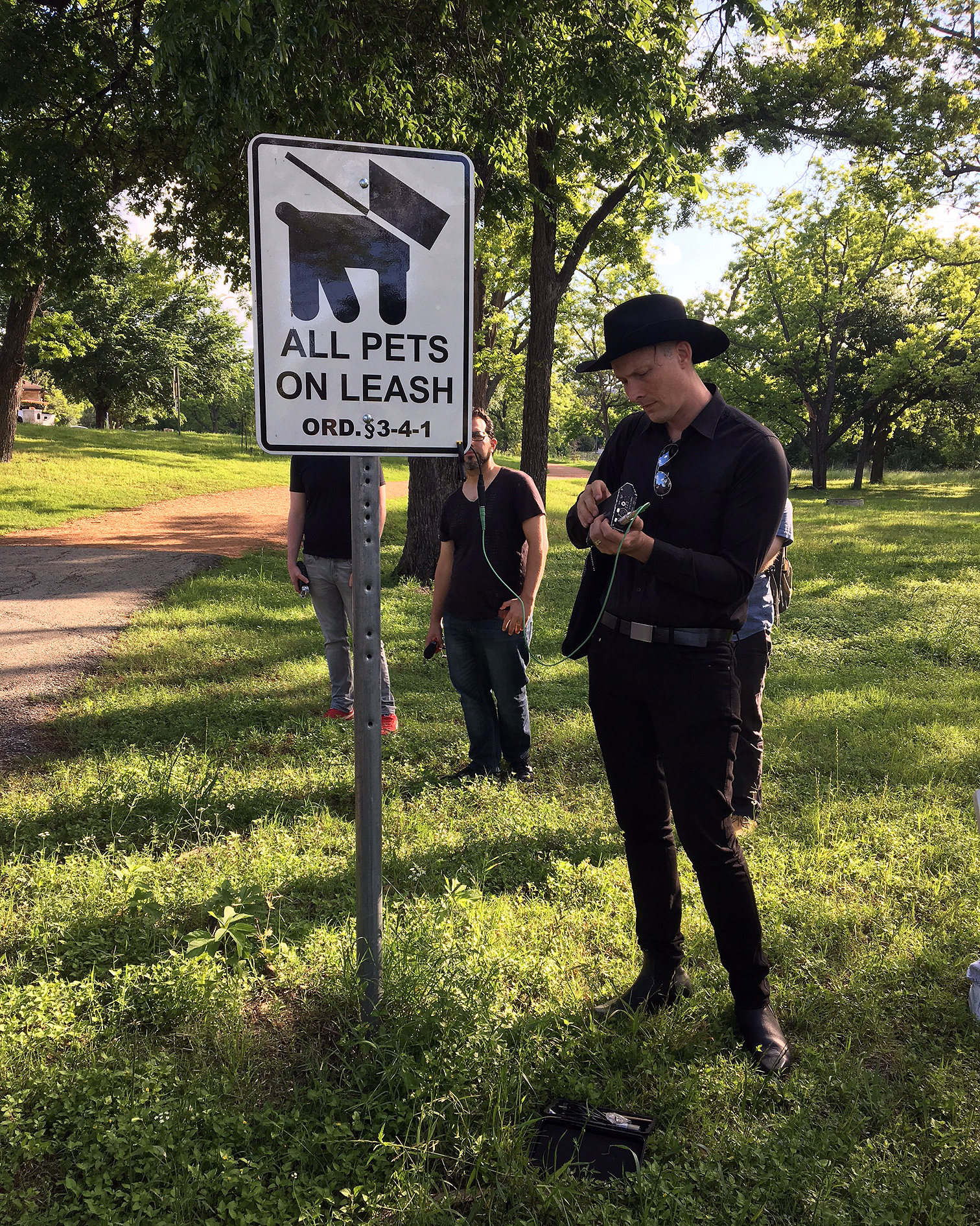 Using a contact microphone to hear wind on the sign. 