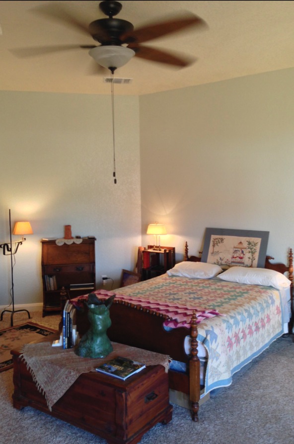 Queen bed in the George & Hanna Miley Suite