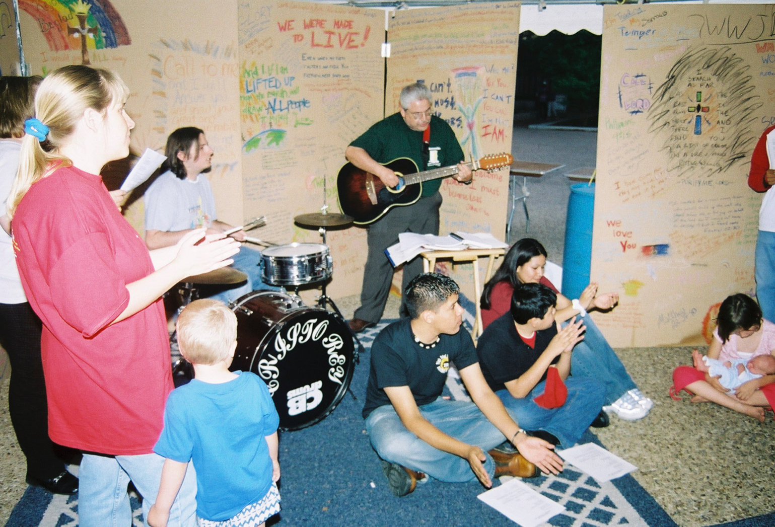 The Cristo Rey Catholic youth group taking a night prayer session in the UT Rez Week 24/7 prayer tent in 2003.