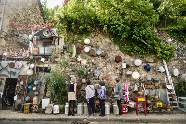 Treasure hunting at an antique shop in the medieval village of Najac. Quite a lot of character all around! The owner is a farmer and wine maker too.