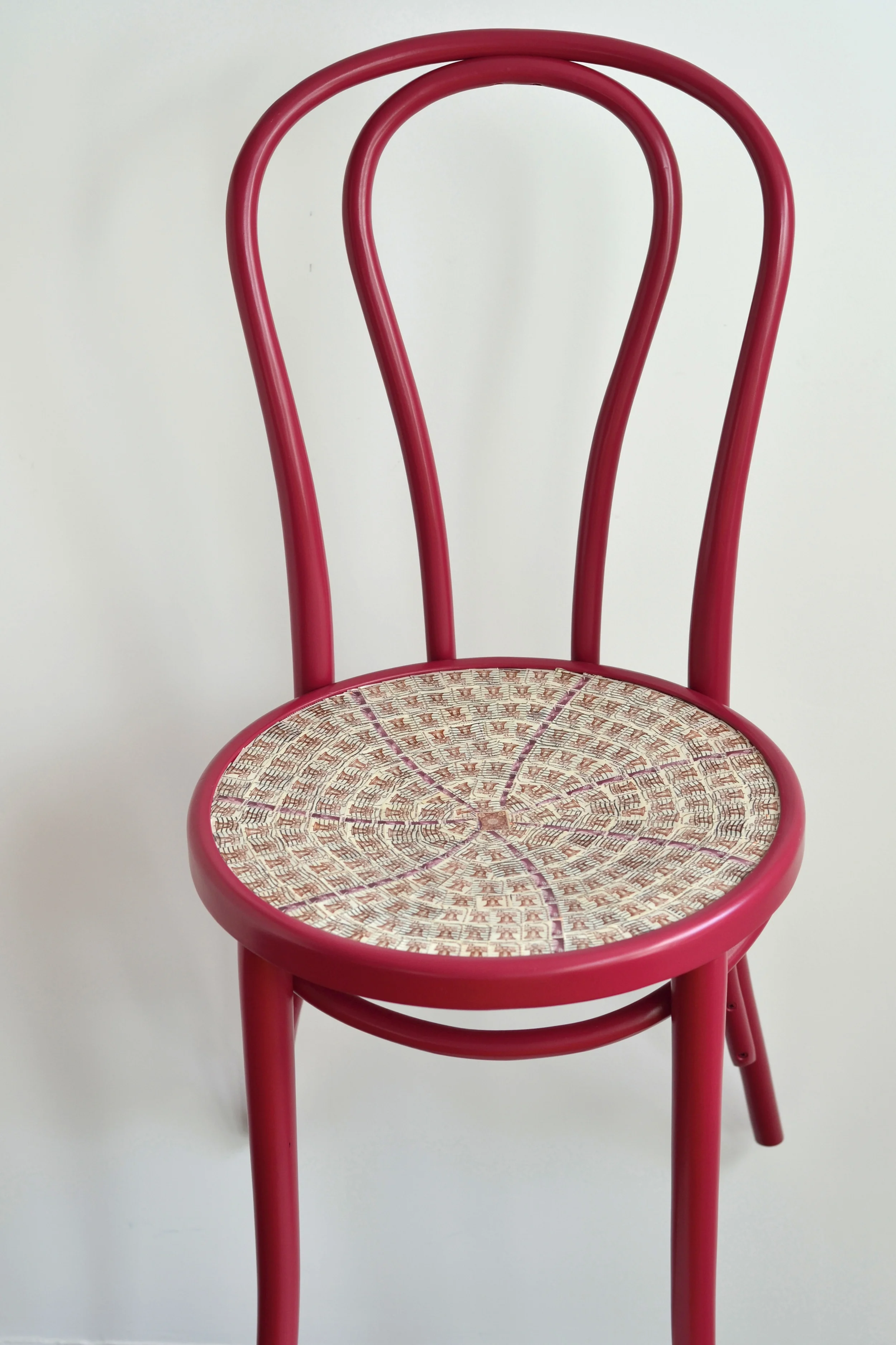 FlyingChairMaroonWhiteBackground.jpg