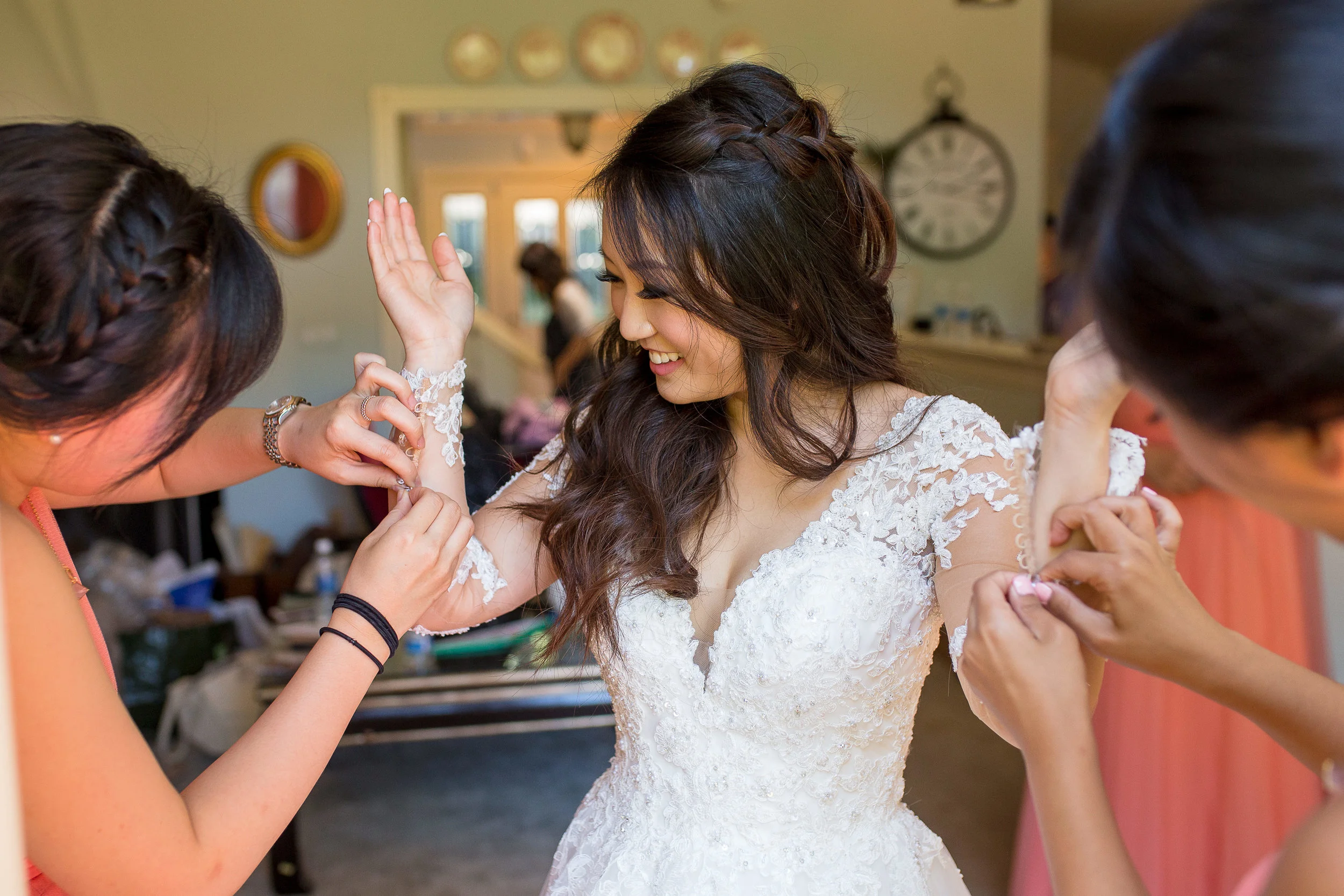 Maybe it doesn't take 2 to button up your sleeves, but why not when you have your bridesmaids there to help?
